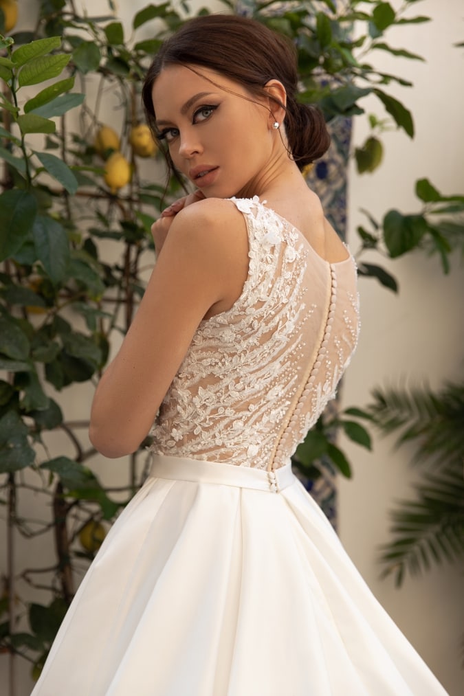 Back detail of a beaded sleeveless wedding dress