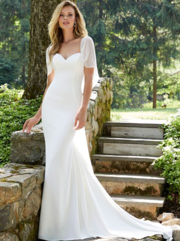 Ivory crepe fit to flare gown with detachable chiffon drape