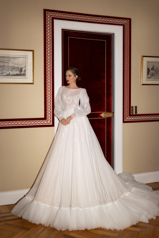 Long blouson sleeve wedding dress with embroidered detail and full skirt