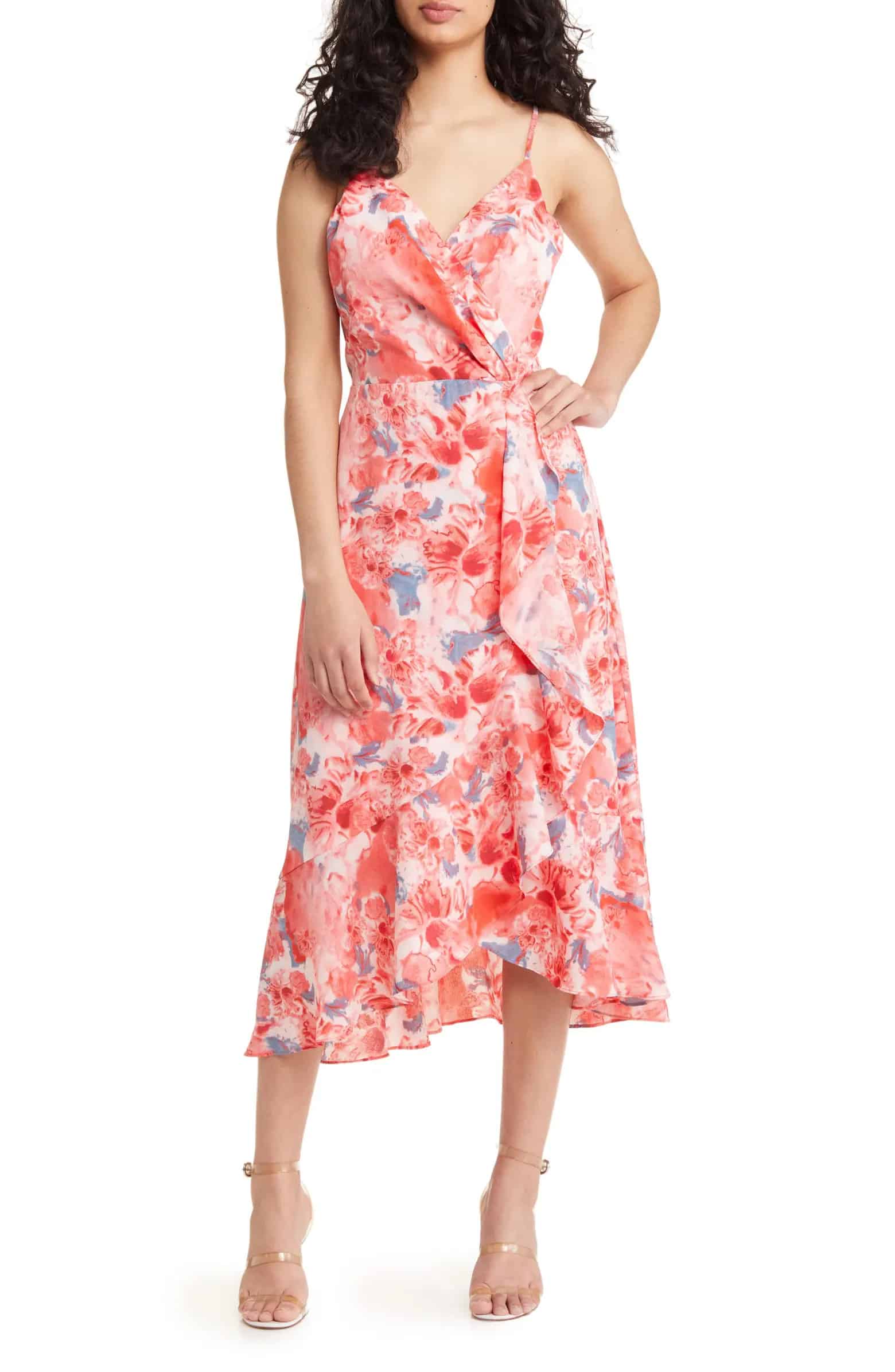 coral printed sundress on a model