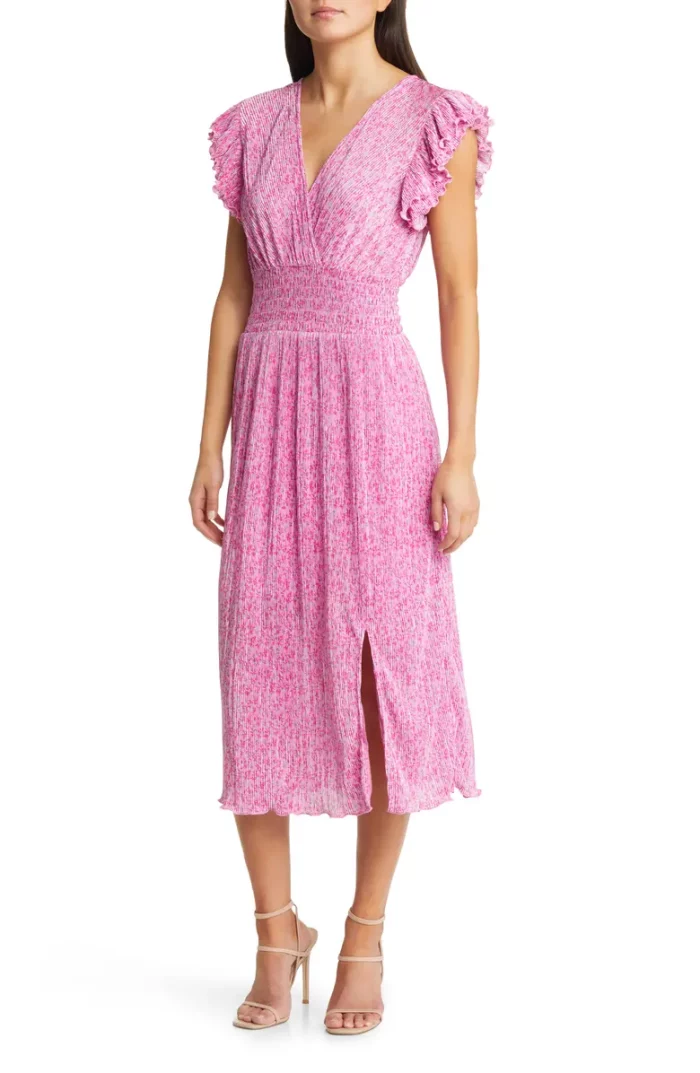 pink printed midi dress on a model