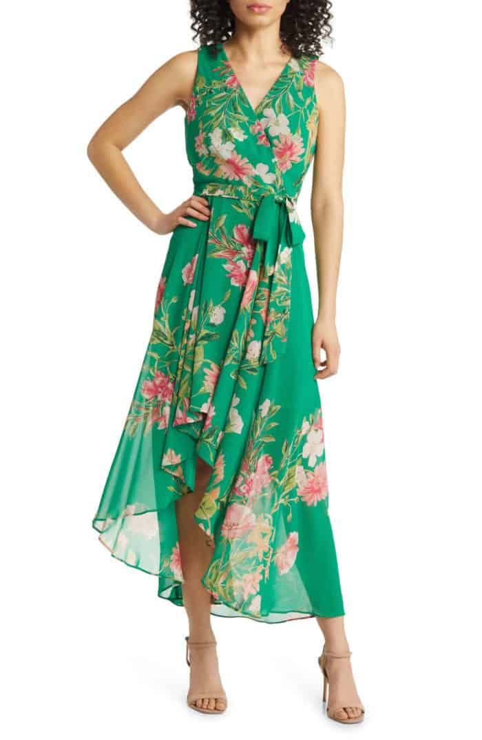 Green sleeveless midi dress with pink flowers shown on model