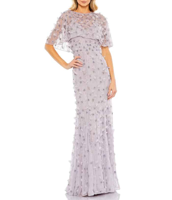 Gray beaded gown with cape shown on model