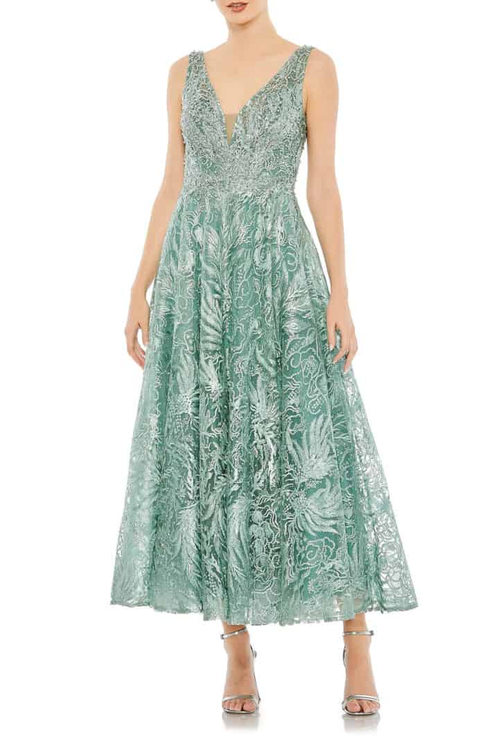 Green lace dress tea length semi formal dress shown on model