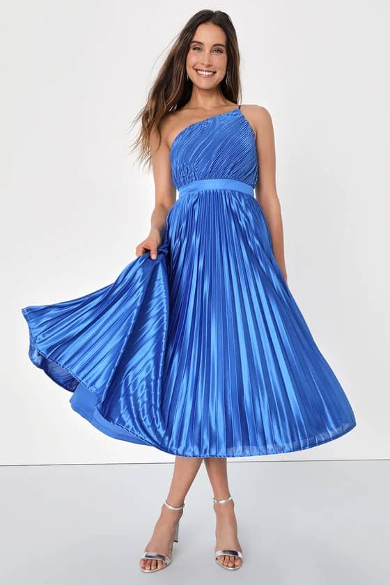 Bright blue pleated one shoulder midi dress shown on a model