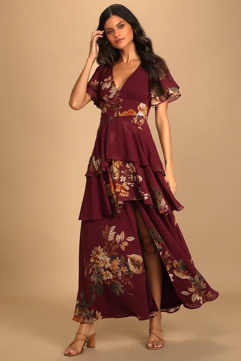 Burgundy floral short sleeve tiered maxi dress shown on a model