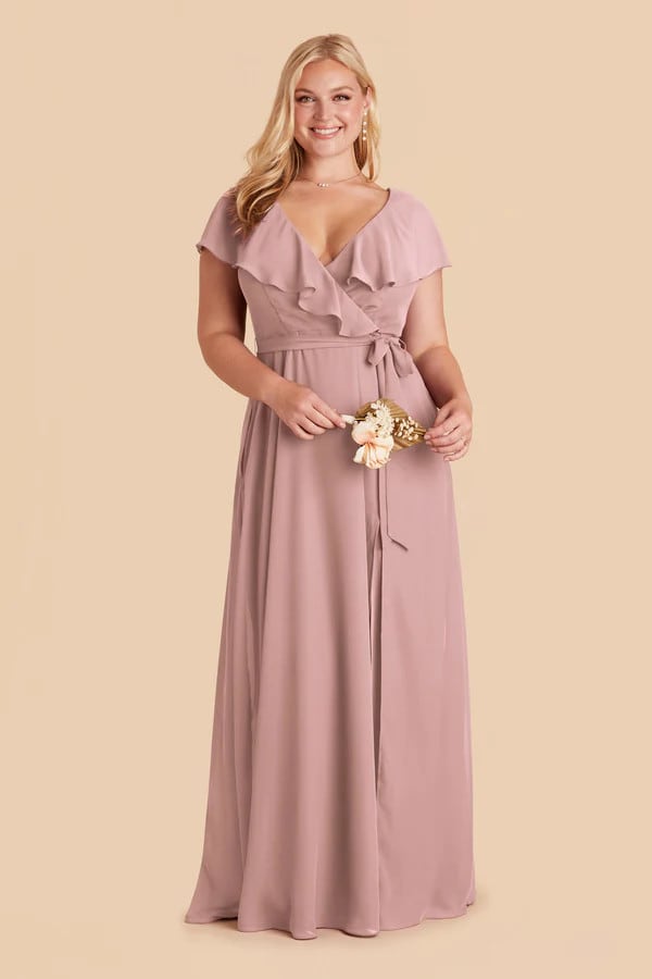 Model wearing pink ruffled maxi dress